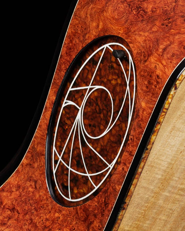 The amber side soundhole cover of Modern Nylon No. 792 in its closed position